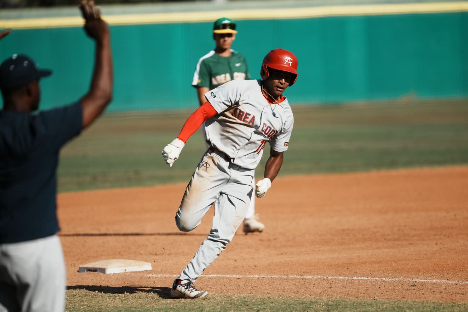 Runner rounding third base