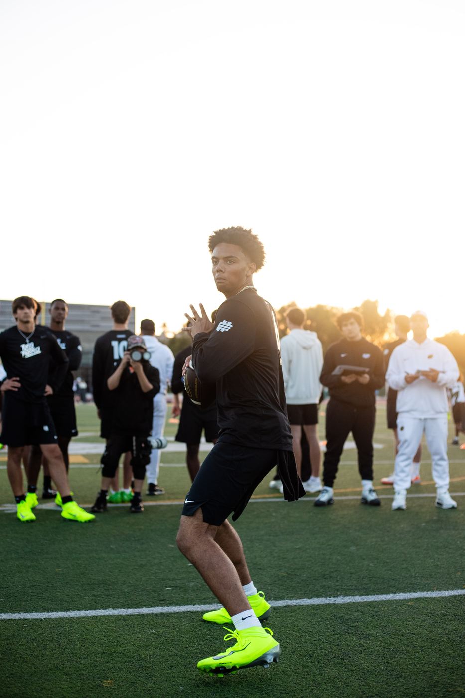 Quarterback dropping back at the Elite 11 Finals