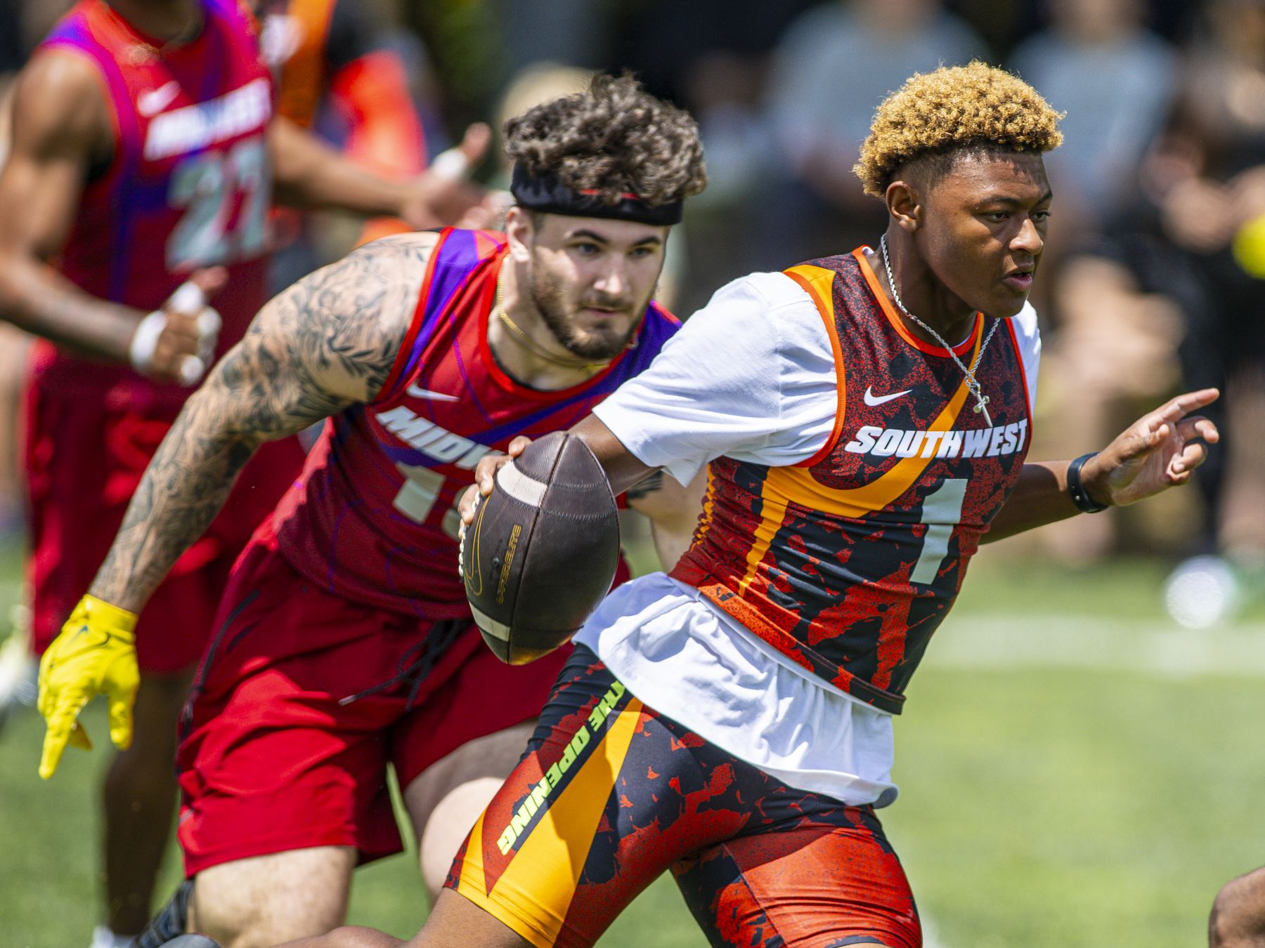 Quarterback scrambling at The Opening