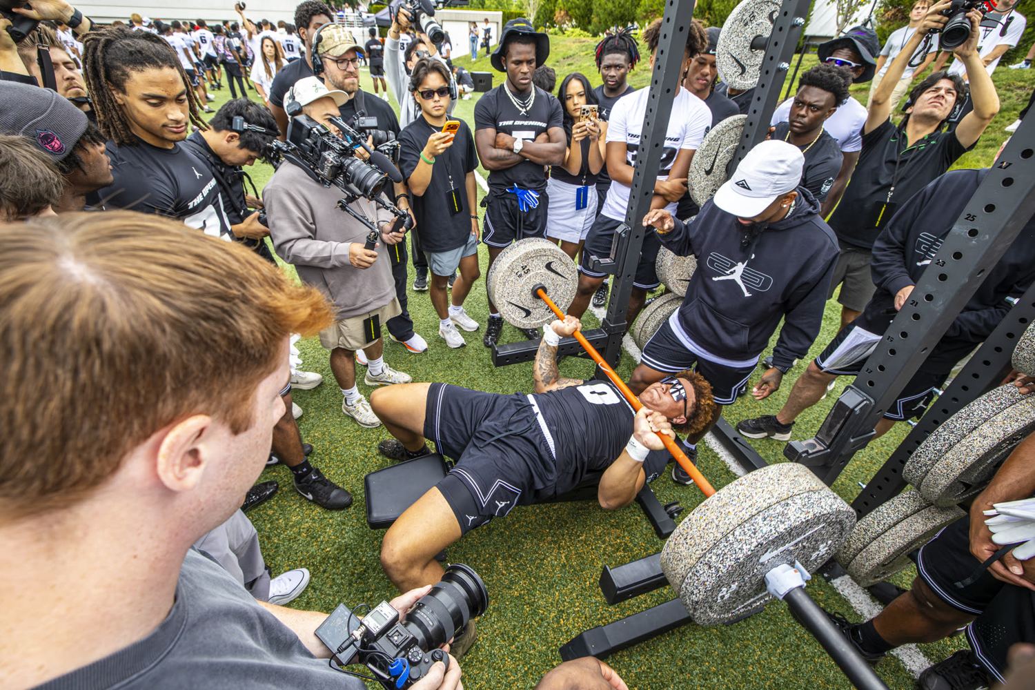 Athletes competing on the bench press